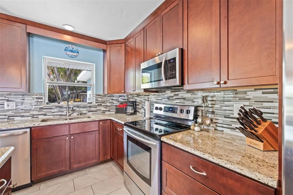 Glass Backsplash with Granite Countertops