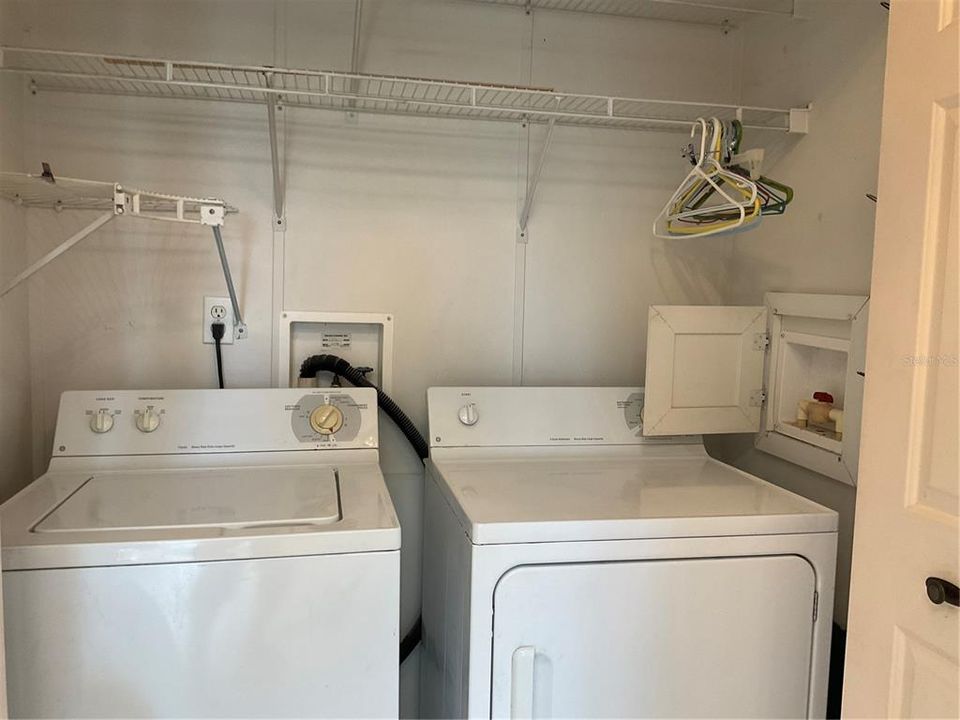 Laundry closet with water shutoff