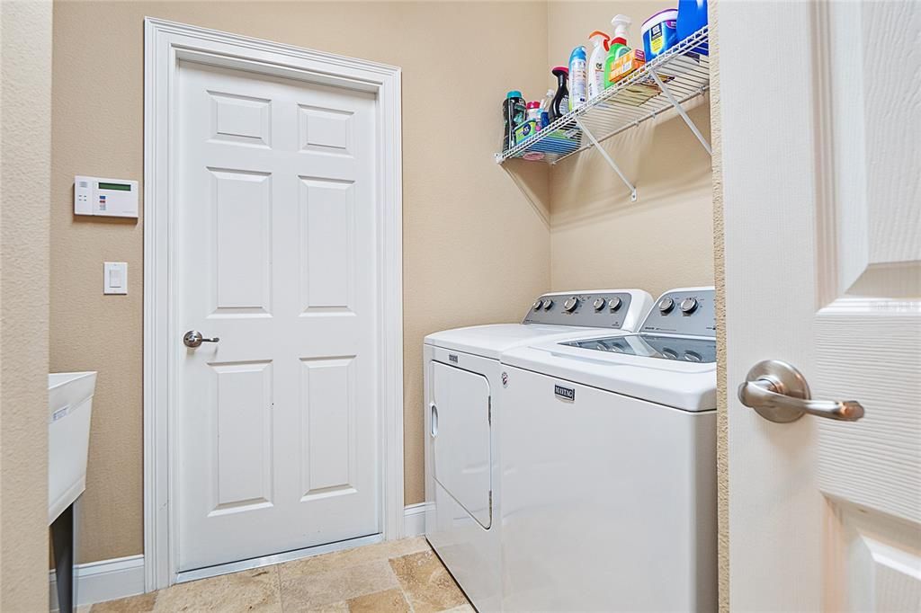 Large laundry room with slap sink