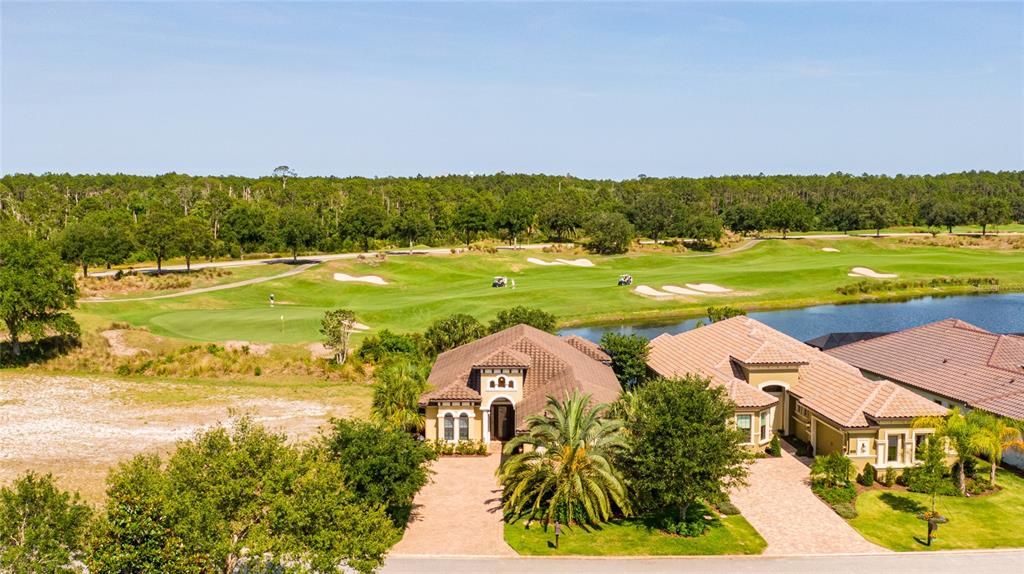 Views from above of the house and golf course