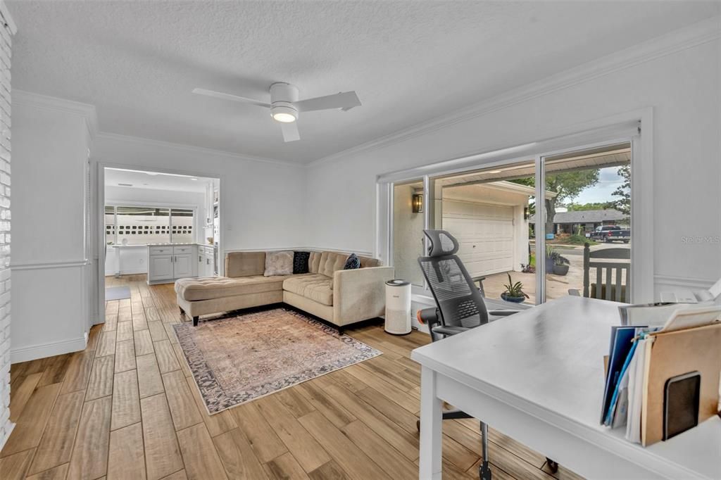 Family room to the  right of foyer.  Kitchen a