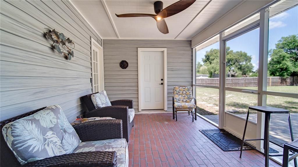 Screened in Lanai shows full bathroom connects to it/family room as room has a door to lanai