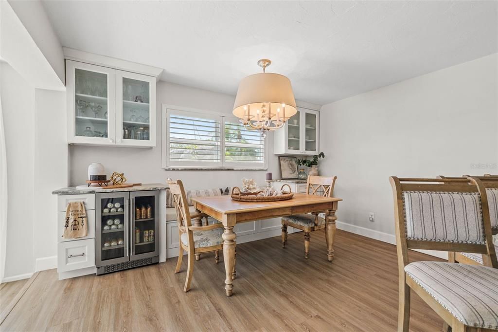 Dining Room with Built-In Cabinetry and Dry Bar/Beverage Fridge.