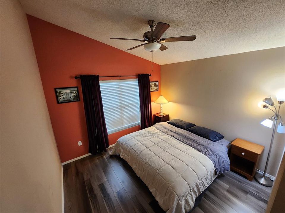 Bedroom 3 with new flooring and ceiling fan