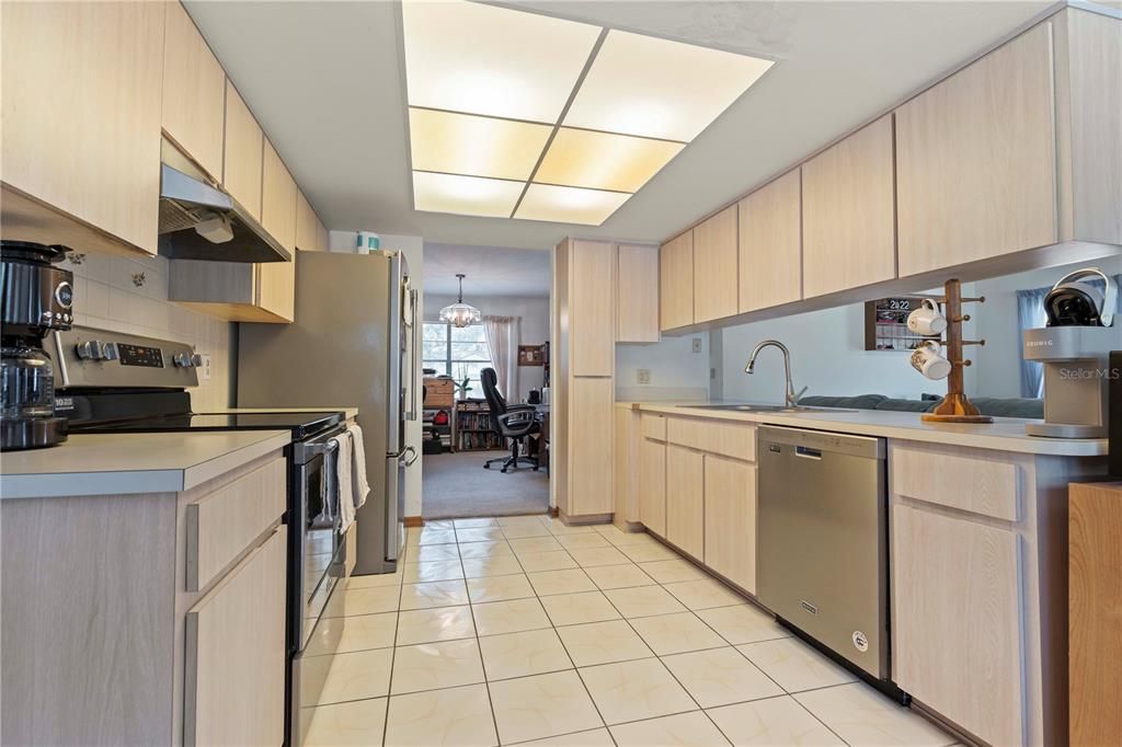 Galley-Style Kitchen with newer stainless steel appliances