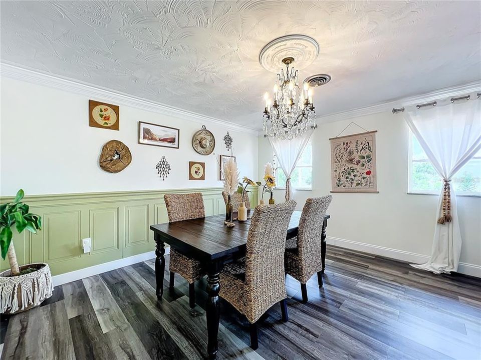 Dining room Elements of Wainscoting, crown molding, Ceiling Medallion, & 5 inch baseboards