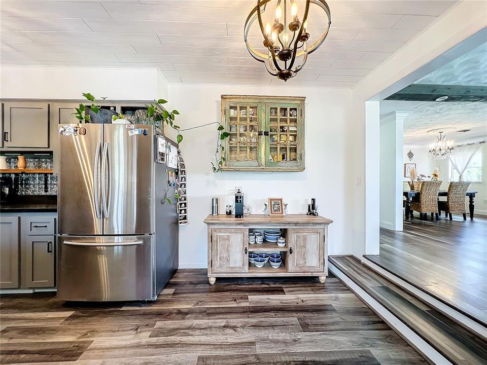 Stainless Steel Refrigerator, Vintage Wall Display Cabinet & Very Wide Entrance to Dining/Living room