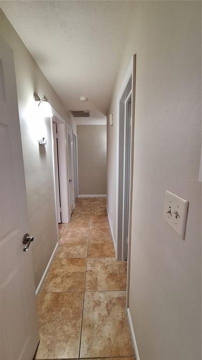 View of front door and living room