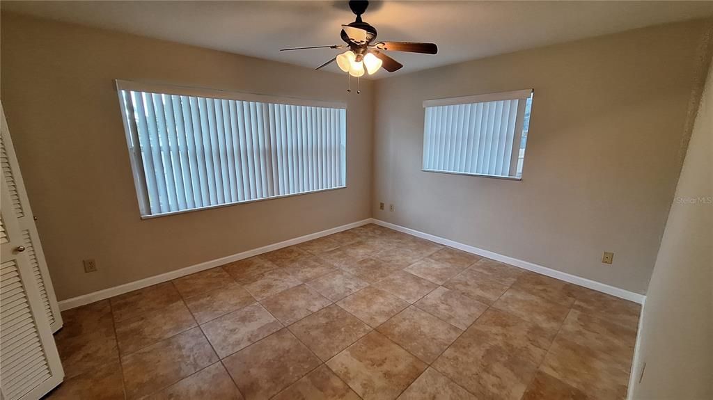 Bedroom 3 withceiling fan and closet