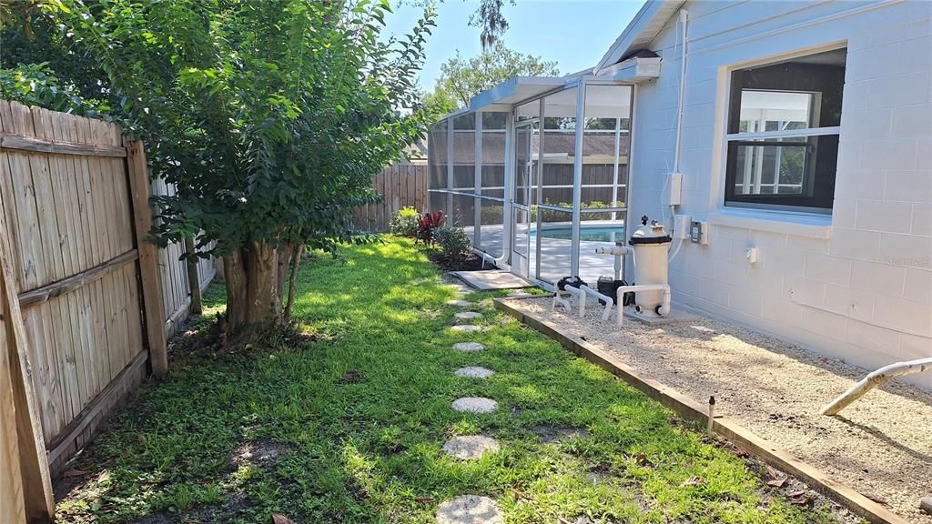 Path from gate to backyard and pool/covered patio.