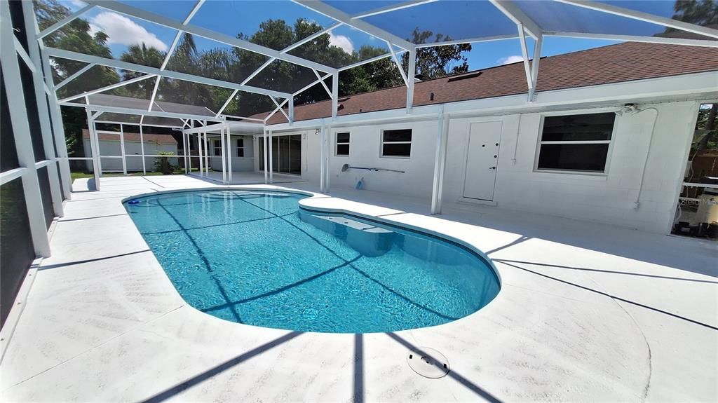 Covered porch area in front of pool 41'x12'.  Additional covered porch area by sliding doors 20'x20'.  Plenty of room for outdoor dining, lounging, grill area, etc.