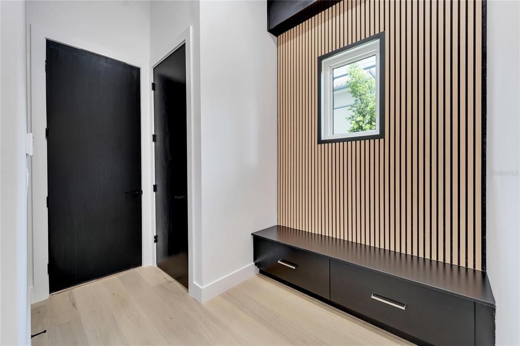 Mud room off garage with storage