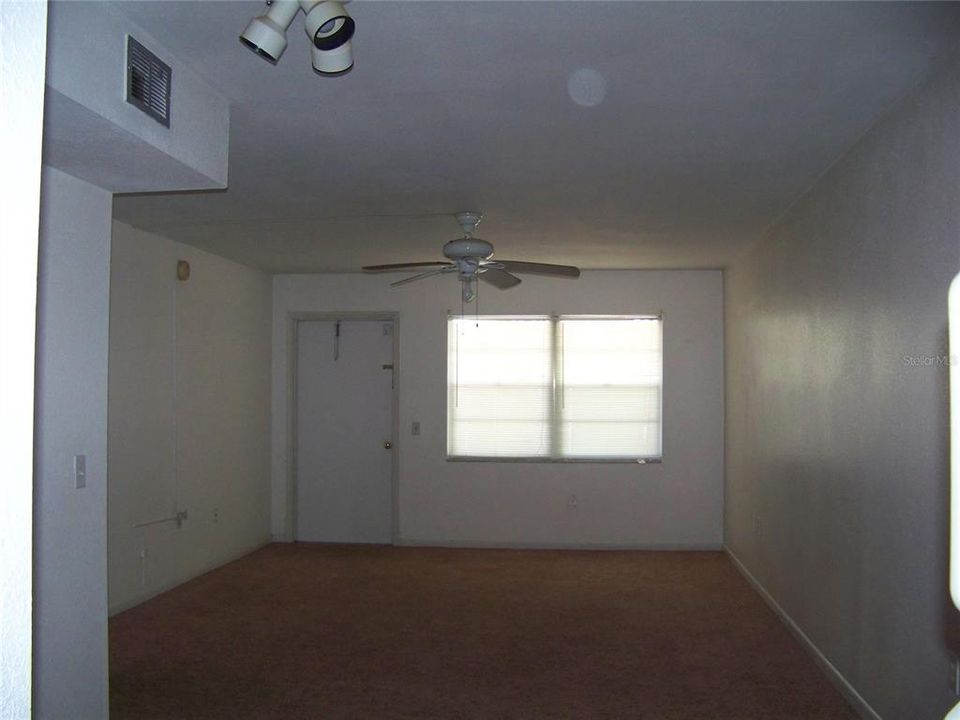 Living  room, view from kitchen  towards front door