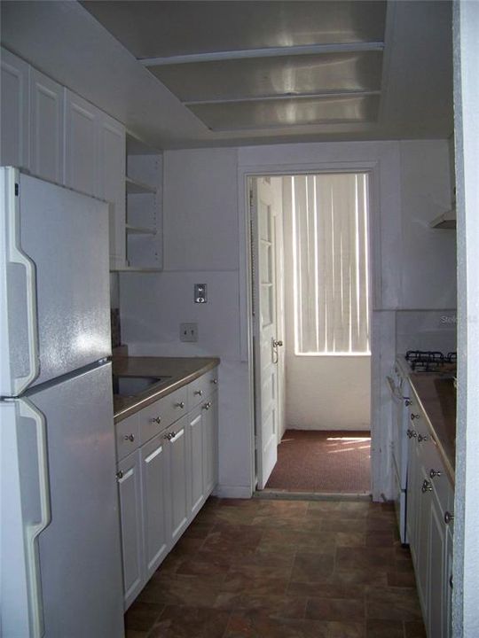 Kitchen- open door leads to Florida room