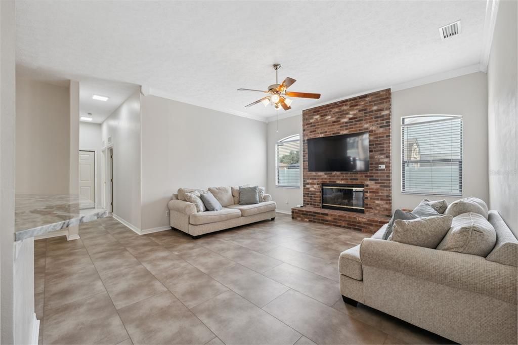 Family room with wood burning fireplace