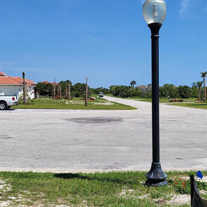 End of cul-de-sac. lot entrance.  Streetlights