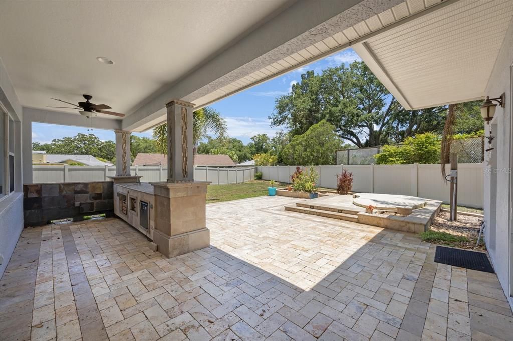 Outdoors with covered lanai and bar