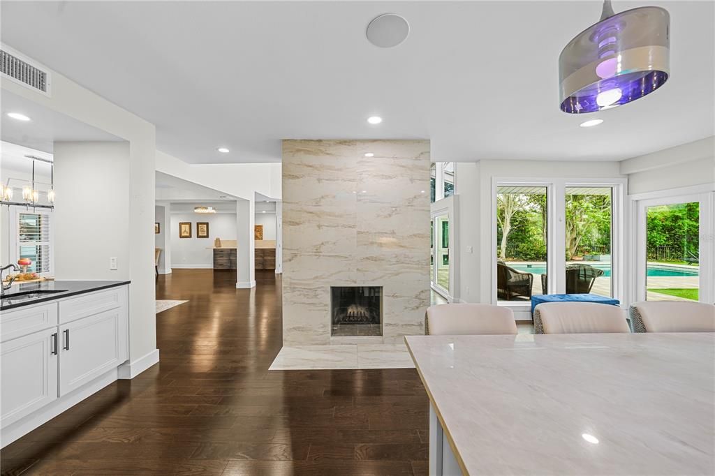 Kitchen features a wood burning fireplace