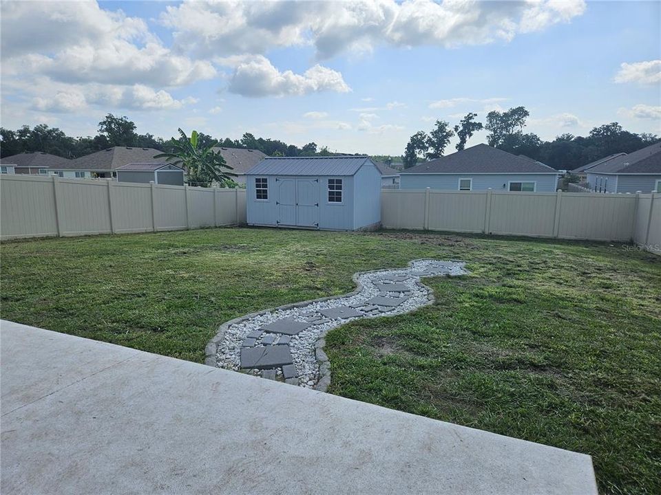 Privacy Fenced back Yard and Shed