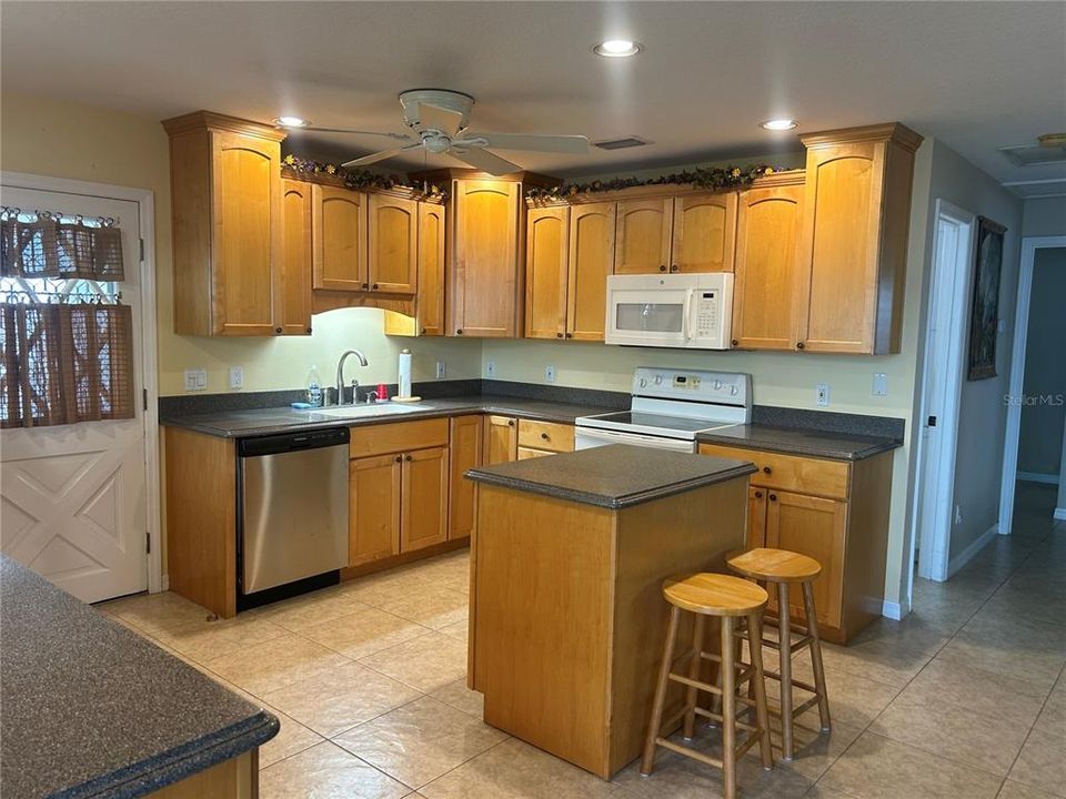 Gorgeous remodeled kitchen-lots of maple cabinets