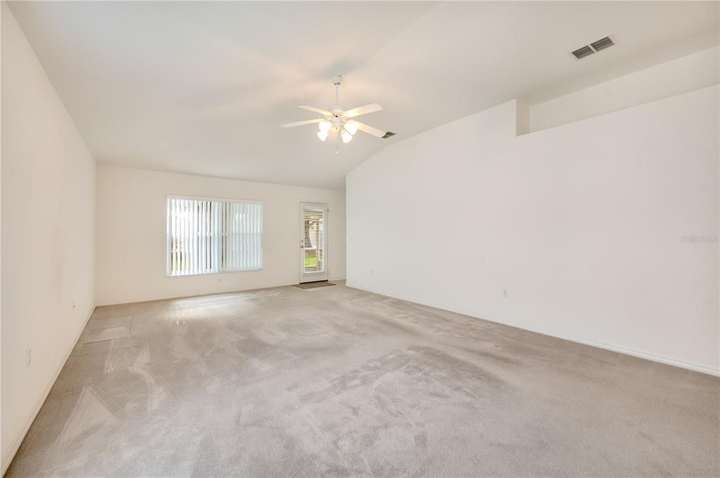 Great Room with door leading out to screened Lanai