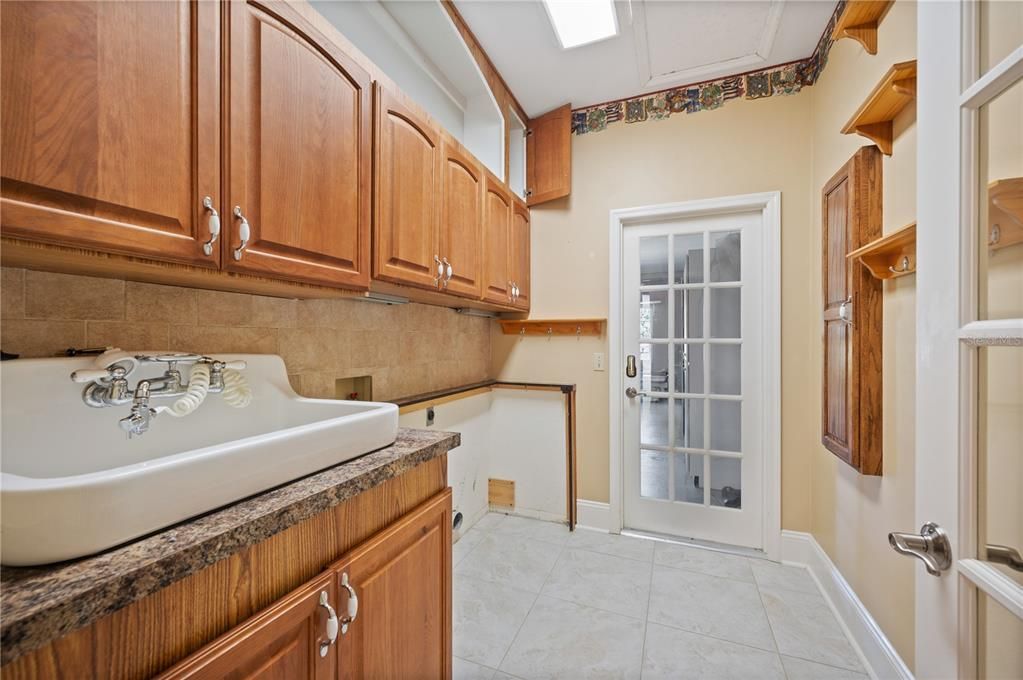 Laundry Room with door leading to garage