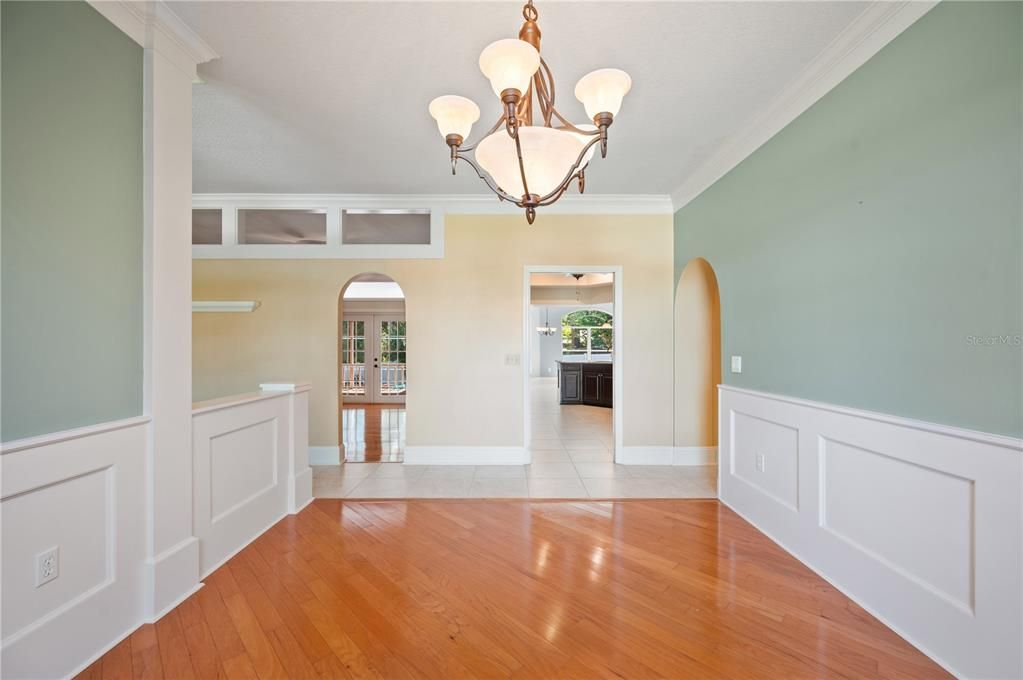 Dining Area - arched doorway leads to Flex Room, doorway to the right leads to Kitchen