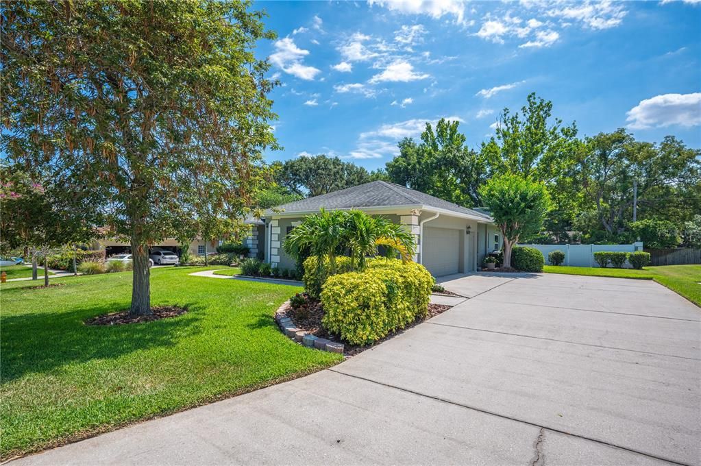 Wide driveway and a side entry oversized 2-car garage