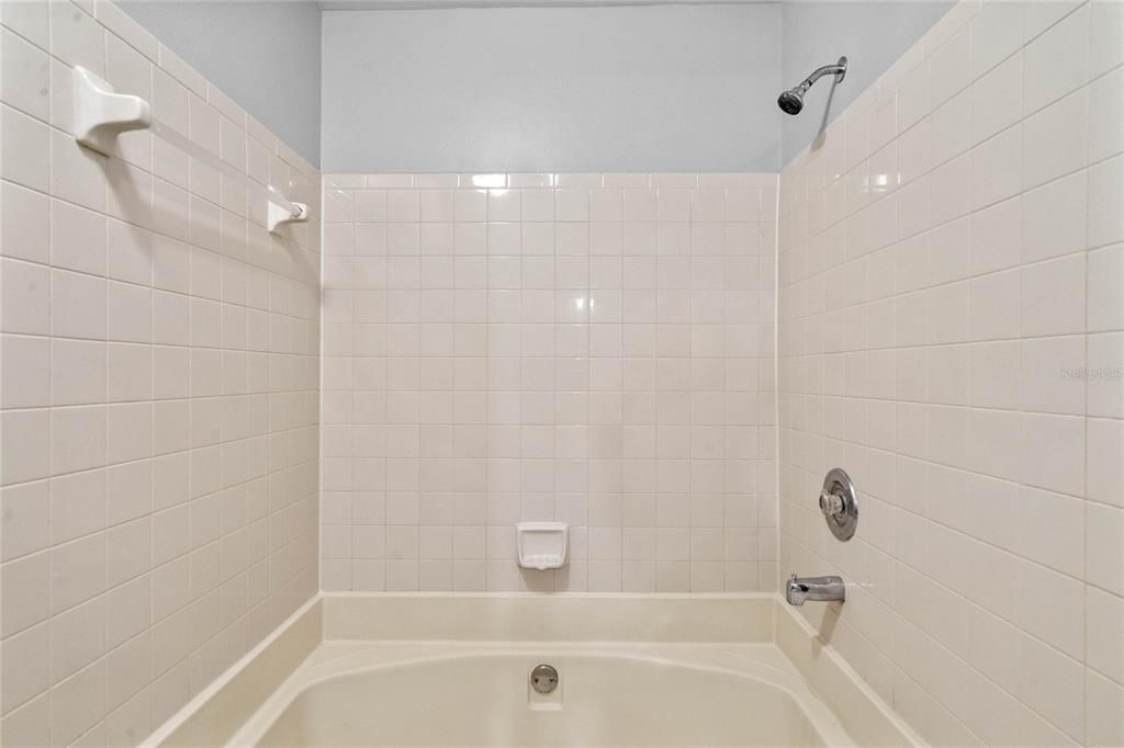 Ensuite features large soaking tub/shower.