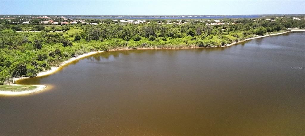 Vizcaya Lakes community lake with views of Myakka River.