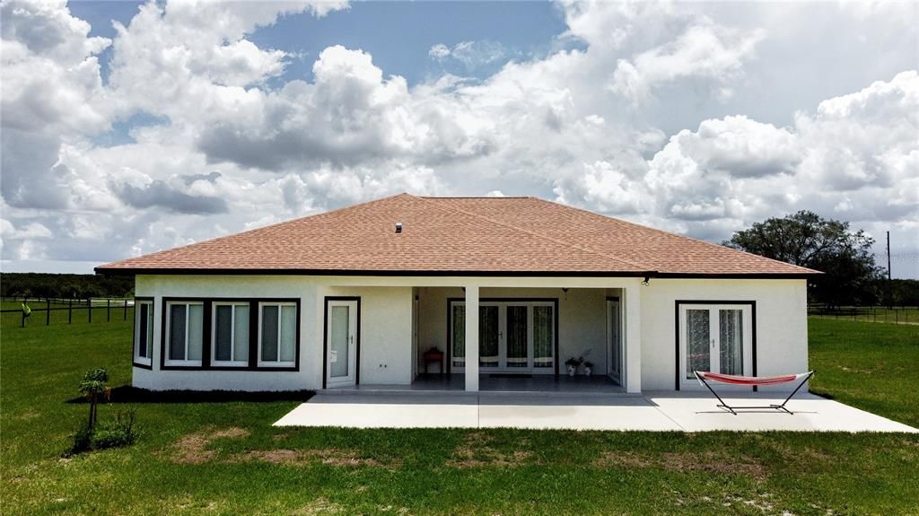 Back covered lanai and open patio- perfect for cookouts!