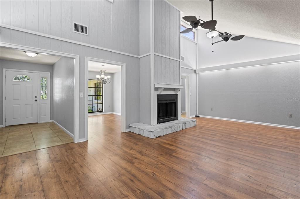 View of front foyer, dining room and large living room