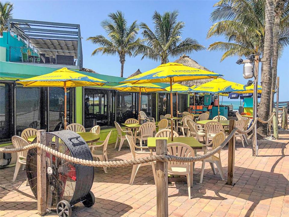 Beachside Sharky's restaurant is just the place for a casual meal with live music and water views.