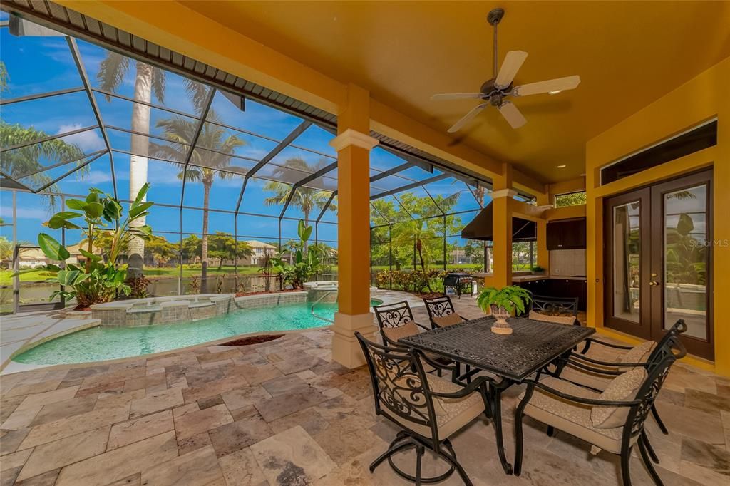 Pool with entertaining and grilling space.