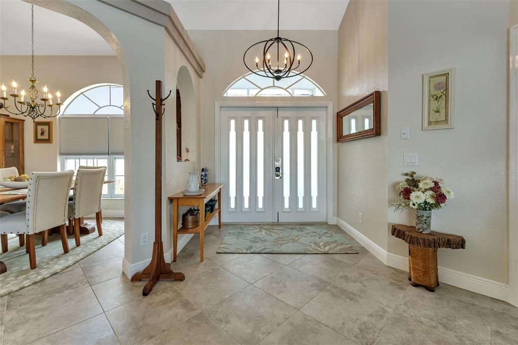 Beautiful foyer that opens up to the living and formal dining room.