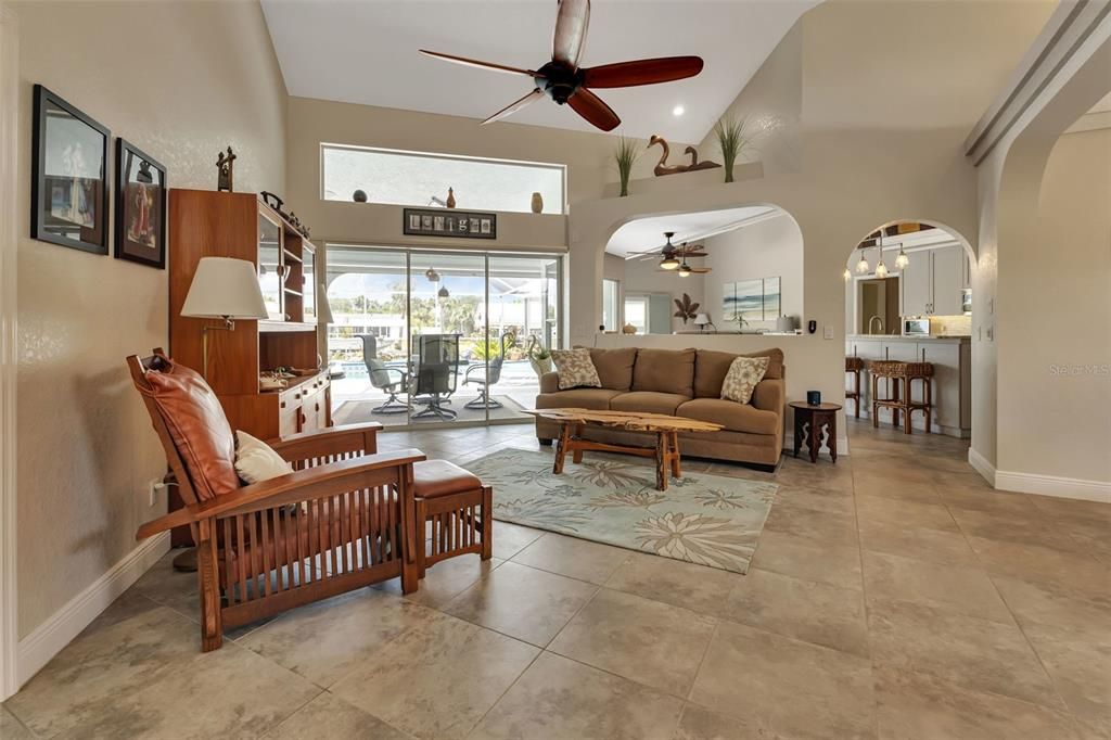 Living room with open concept to dining room and kitchen.