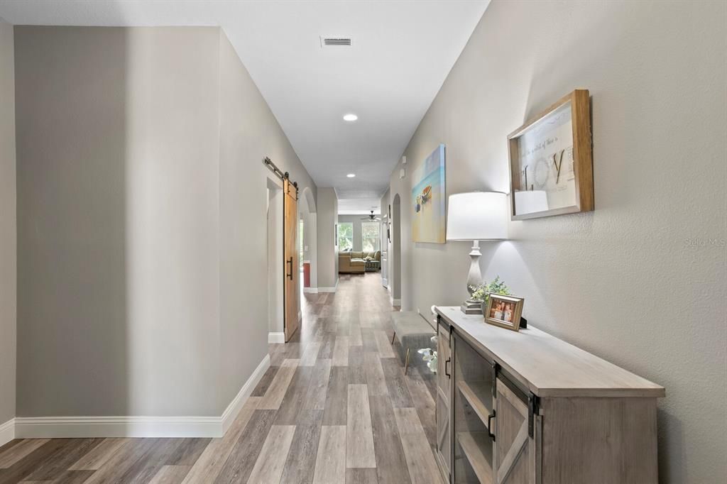 Upon entering the home, you'll find new luxury vinyl floors throughout the home