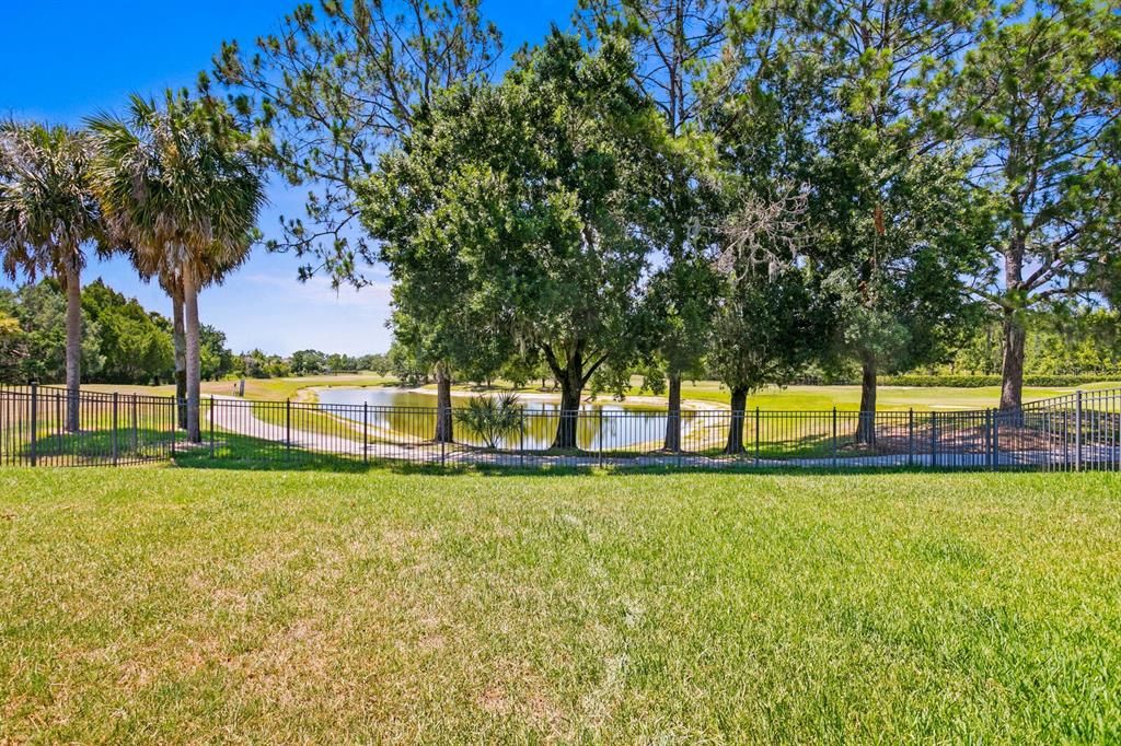 Enjoy water and golf course views from your backyard