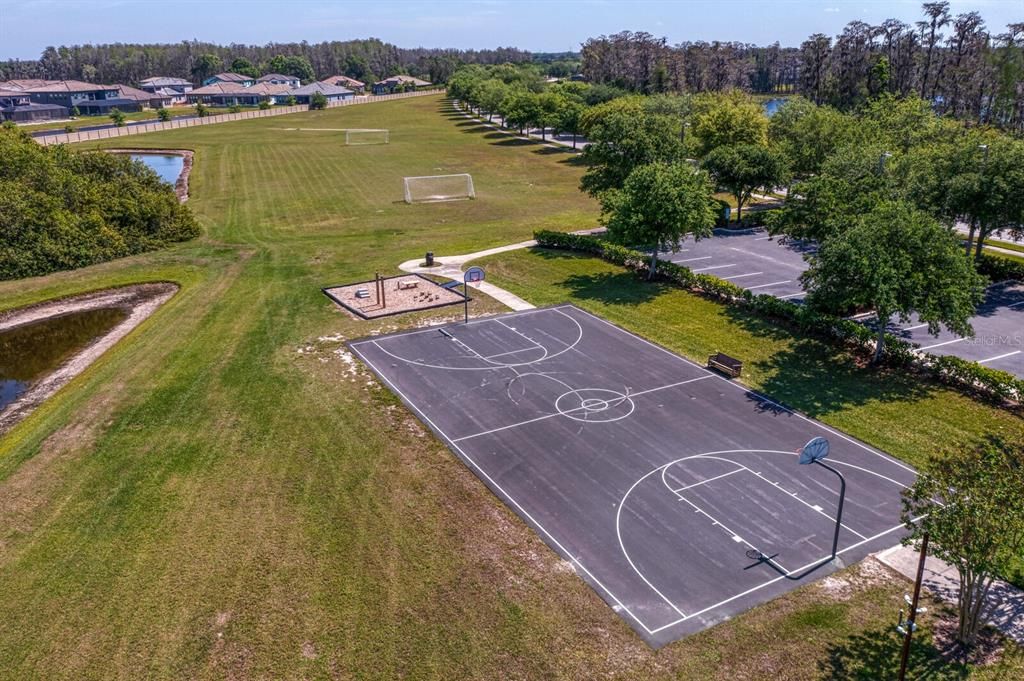 Community basketball courty and outdoor gym