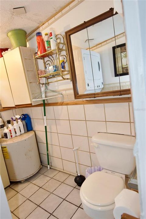 Laundry and 1/2 bath by attached to the bonus room.  NO AC.