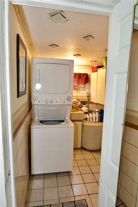 Laundry and 1/2 bath by attached to the bonus room.  NO AC.