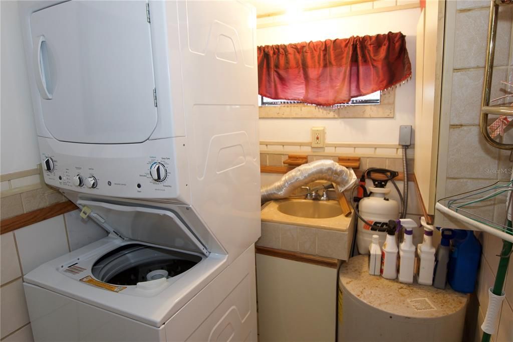 Laundry and 1/2 bath by attached to the bonus room.  NO AC.