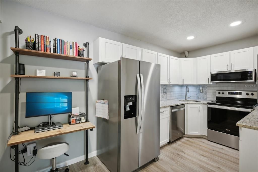 Kitchen showing work area or space for additional buffet/serving table