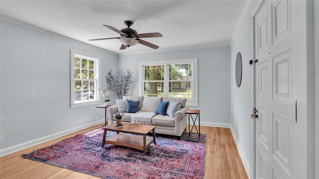 Living room with wood burning fireplace