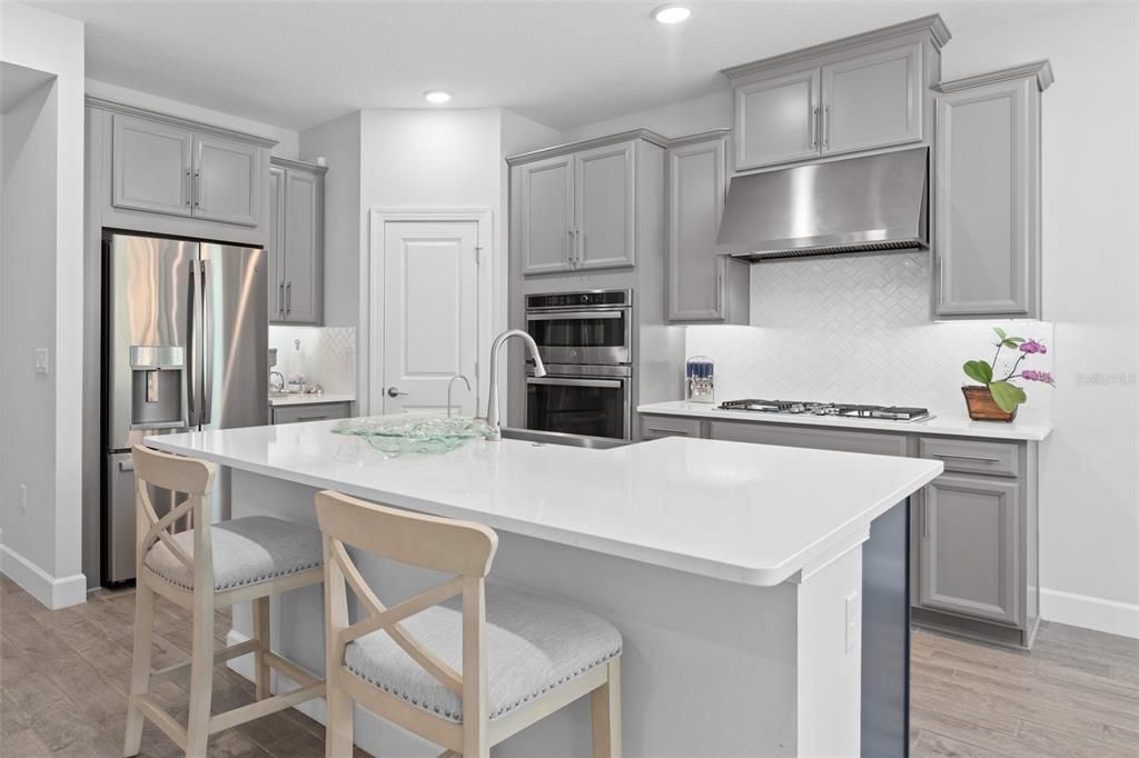 Kitchen with a view of the Foyer area