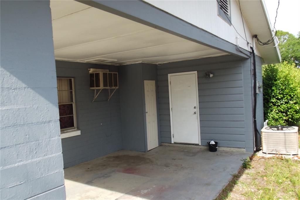 Carport doorway to utility room