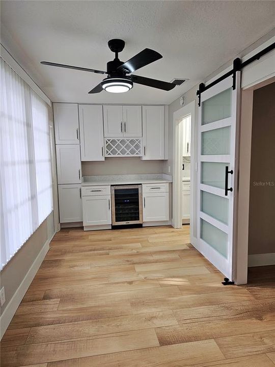 florida room with extra cabinetry and counter space