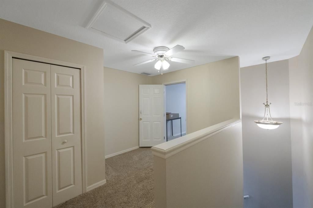 Upstairs landing area outside the bonus room.