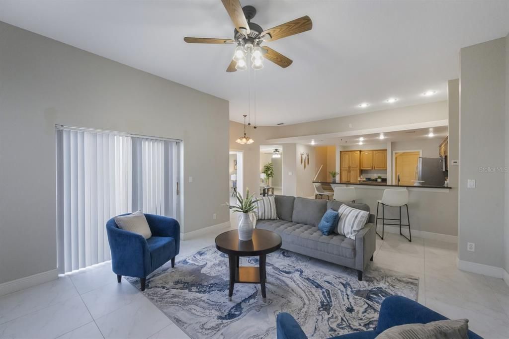 Family room looking at the sliding glass door, into the kitchen.