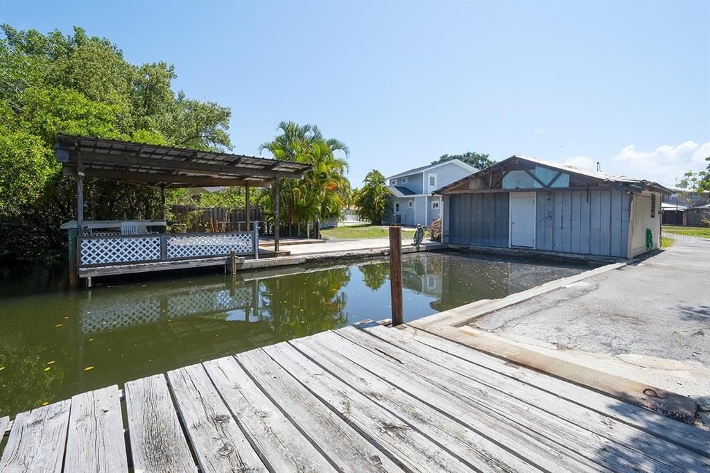 Boat Slip, Covered Patio, and Boathouse Shed